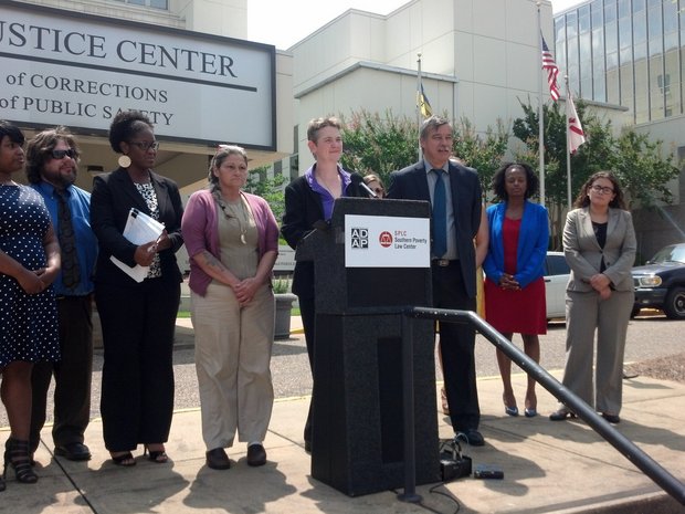 Maria Morris, managing attorney for the Southern Poverty Law Center, announces a federal lawsuit against the Alabama Department of Corrections alleging that the system violates federal law by ignoring inmates' medical and mental health needs. Morris spoke outside DOC's offices in Montgomery, Ala., on June 17, 2014. Morris was joined by William Van Der Pol Jr., staff attorney for the Alabama Disabilities Advocacy Program, which is also taking part in the lawsuit, alleging discrimination against prisoners with disabilities. (Mike Cason/mcason@al.com)